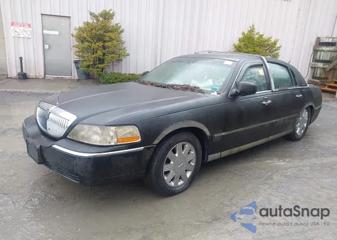 2004 Lincoln Town Car Ultimate из США, поврежденный, VIN 1LNHM83W64Y657300